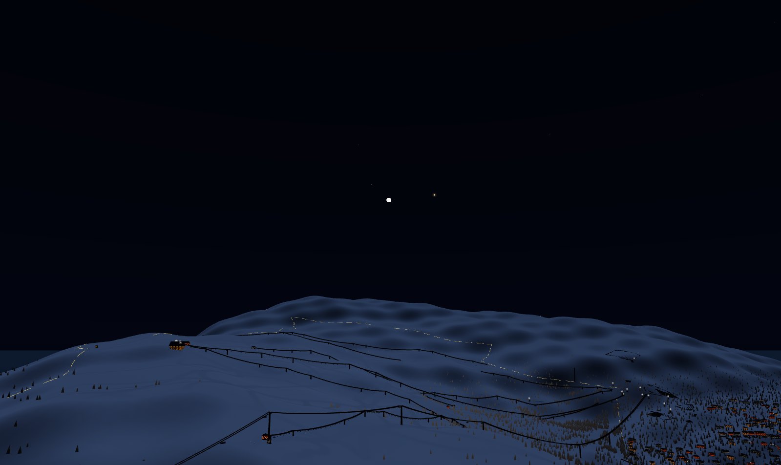 A mountain at night under the stars